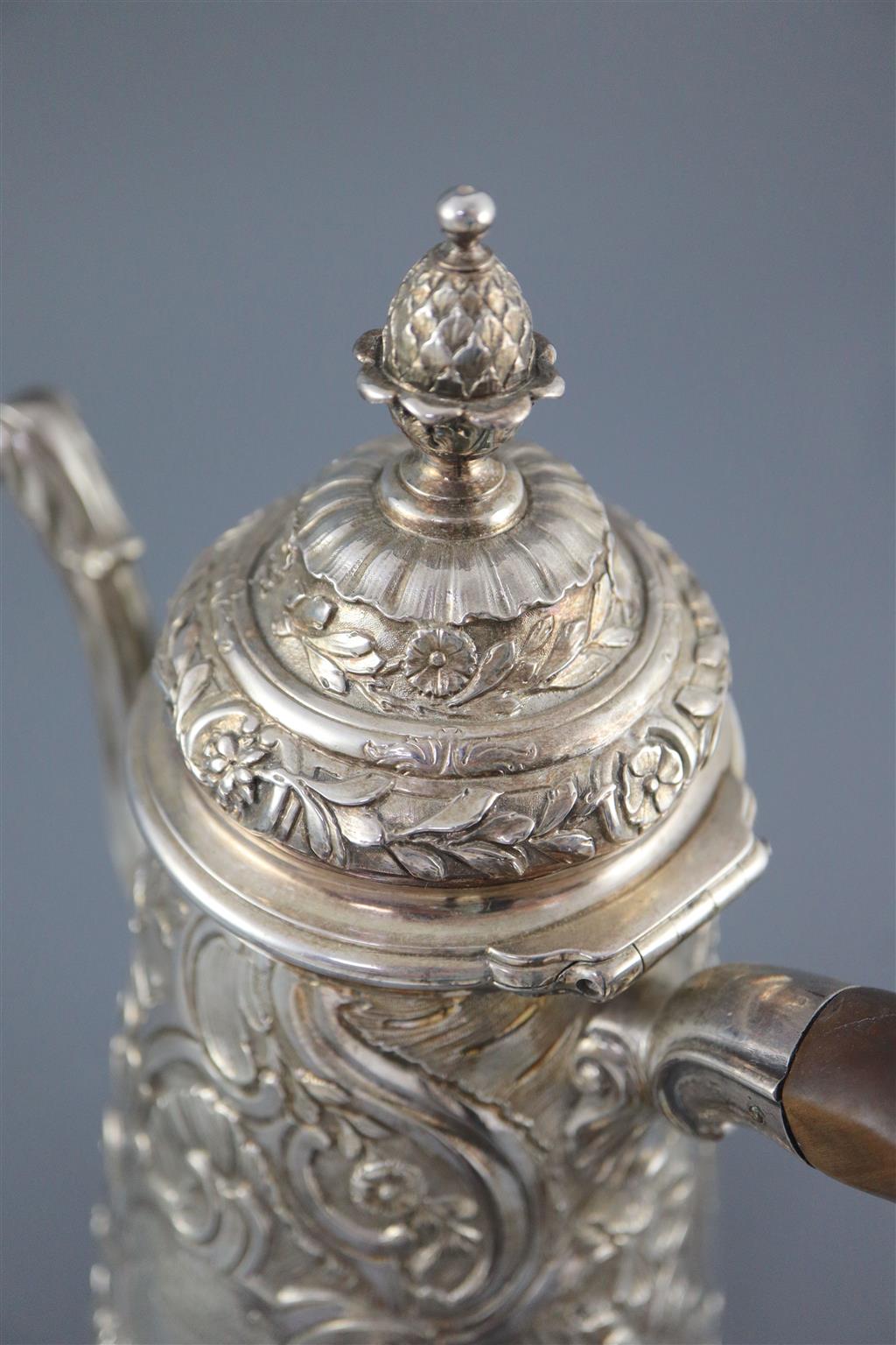 A late George II rococo tapered cylindrical coffee pot by Edward Aldridge, gross 26.5oz.